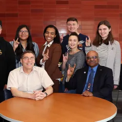 Physicist and Nobel Prize winner Carl Wieman posing with students