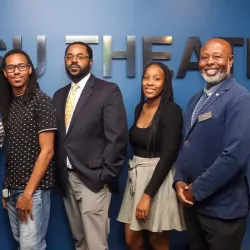 The Black Faculty Promotion Celebration honored Marc Robinson, center, associate professor of history, for his hard work, dedication and contributions to the academic community, as well as strengthened the social network that supports Black success at CSUSB.