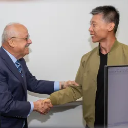 CSUSB President Tomás D. Morales with Qingquan Sun, professor in the School of Computer Science and Engineering