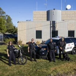 From left, Sgt. Devon Herrington, Sgt. Jose Plasencia, Chief John Guttierez, K9 Officer Manuel Aguirre and Police K9 Vader. The CSUSB University Police Department celebrates 50 years of service in 2024.