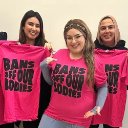 Members of the Intersectional Feminist Alliance, a new student-led organization at CSUSB that advocates for gender equity and women’s empowerment, display their club apparel.