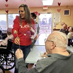 In the spirit of Valentine’s Day, Cal State San Bernardino’s Office of Community Engaged Learning partnered with Wish of a Lifetime to hand-deliver roses to residents at Valley Health Care Center on Feb. 14.
