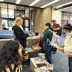 Rebecca Lubas, CSUSB Libraries dean, meets with students during the fall semester's first "Pop-Tart, Pop-in!" event, which continues each Monday at noon at the John M. Pfau Library.