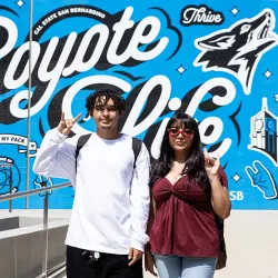 Two students were all smiles in front of the Santos Manuel Student Union North on the first day of fall classes at CSUSB. 