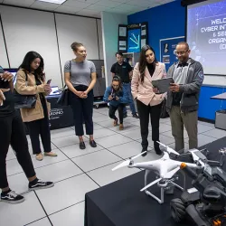 Student members of the Cyber Intelligencve & Security Organization (CISO) club present their cybersecurity projects to Sabrina Cervantes, (assemblymember of District 58).