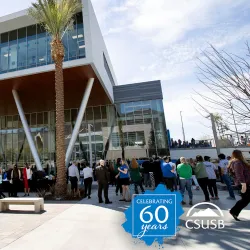 Students, faculty, staff and friends of the university attended the ribbon-cutting ceremony officially opening the Santos Manuel Student Union North in 2022.