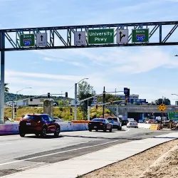 Traffic moves through the University Parkway-Interstate 215 interchange, looking south toward the freeway overpass.
