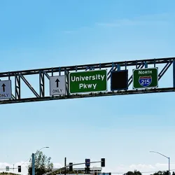 Traffic signage at University Parkway-Interstate 215 interchange, looking south toward the freeway overpass.