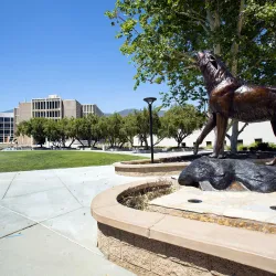 Wild Song statue and the John M. Pfau Library in the background