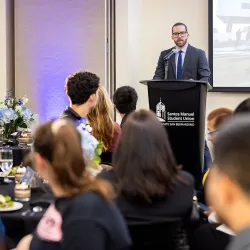 Jacob Jones, faculty director of the University Honors College, speaks to students at the recent Presidential Academic Excellence Scholarship Dinner.