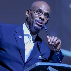 Kerry Neal, director of philanthropy at CSUSB, serves as the master of ceremony at the 10th annual Pioneer Breakfast in 2023. 