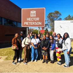During their study abroad trip to South Africa this summer, CSUSB students and university President Tomás D. Morales met Antoinette Sithole (standing front, center), whose brother, Hector Pieterson, was killed during the 1976 Soweto Uprising.