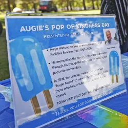 A table for “Augie’s Pop of Kindness Day’ that celebrates the legacy of kindness personified by the late Augie Hartung.