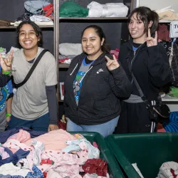 Four students during Coyote Cares Day 2024.