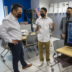 U.S. Rep. Pete Aguilar (left) and students at the CSUSB Cybersecurity Center during a visit on Aug. 29.