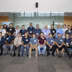 Students participating in the Project Impact program during an event in May 2022 at the James R. Watson and Judy Rodriguez Watson College of Education.