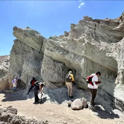 Geological sciences students studying rock formations