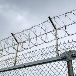 Barbed wire fencing. “The Impact of the Carceral State on the Lives of African American Women.