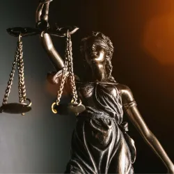 Criminal justice illustration of the scales of justice.