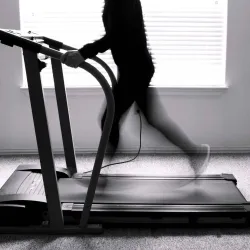 Exerciser on a treadmill.