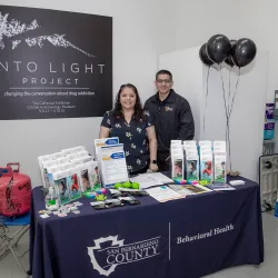 San Bernardino County Social Services staff members Monica Rosas (left) and Daniel Mendez met with students, staff and faculty in CSUSB’s Anthropology Museum during Black Balloon Day, an event that brought awareness to the dangers of drug overdoses and substance use disorder.