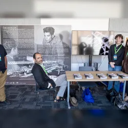 From left to right: Edward Gomez, CSUSB associate professor of art, artist Daniel Ruanova, Samuel White and Rosalia Romero, both from Pomona College, at the display of the LEAD Summit XI’s featured exhibit.