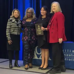 Monica Alejandre, second from right, was awarded receiving the Auxiliary Organizations Association Outstanding Accomplishment Award.