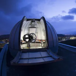An open telescope dome at the Murillo Family Observatory at CSUSB.