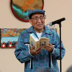 Carolyn Horsman (left) and Ernest Siva, elder of Morongo Band of Mission Indians, at the annual Native Voices Poetry Festival at the Dorothy Ramon Learning Center in Banning in February.