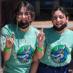 Three CSUSB student volunteers at the 2022 Coyote Cares Day