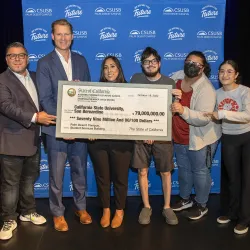 From left: Assemblymember Eduardo Garcia and Assemblymember Chad Mayes present a check to Sarah Lopez, CSUSB Palm Desert Campus vice president of Associated Students Inc.; Andrew Hunter, CSUSB student; Sasha Baltazar, Rancho Mirage Student Center coordinator; and Yunuen Cerano, student assistant