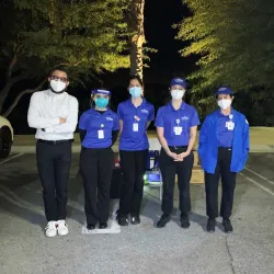 Four CSUSB Palm Desert Campus nursing students (in the blue tops) provide flu shots at a drive-thru flu shot clinic at the North Shore Beach and Yacht Club at the Salton Sea.  