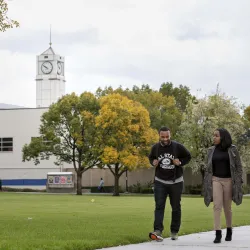 Students walk by the Santos Manuel Student Union.