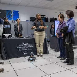 A CSUSB cybersecurity student leads a demonstration in the Cybersecurity Center. CSUSB is leading a pilot partnership with Fresno State and San Jose State named Work Force Innovation Technology Hubs Cyber – better known as WITH Cyber.