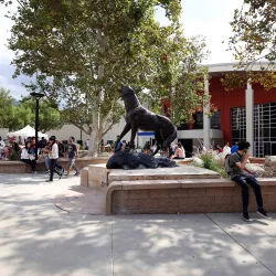 Students at the Wild Song statue 