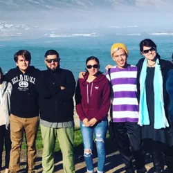 CSUSB students and Tiffany F. Jones, professor of history and department chair, in front of Camps Bay, Cape Town. Photo courtesy of Tiffany Jones