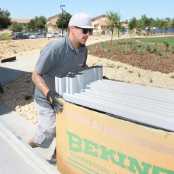 mover delivering furniture to student housing