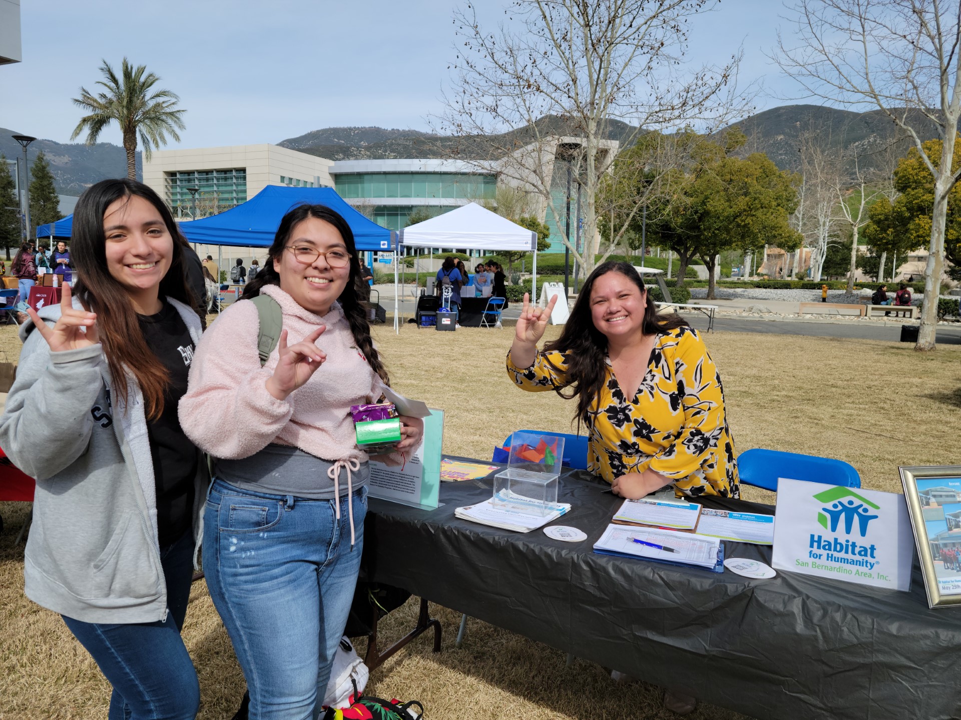 Picture of community partner tabling at the fair.