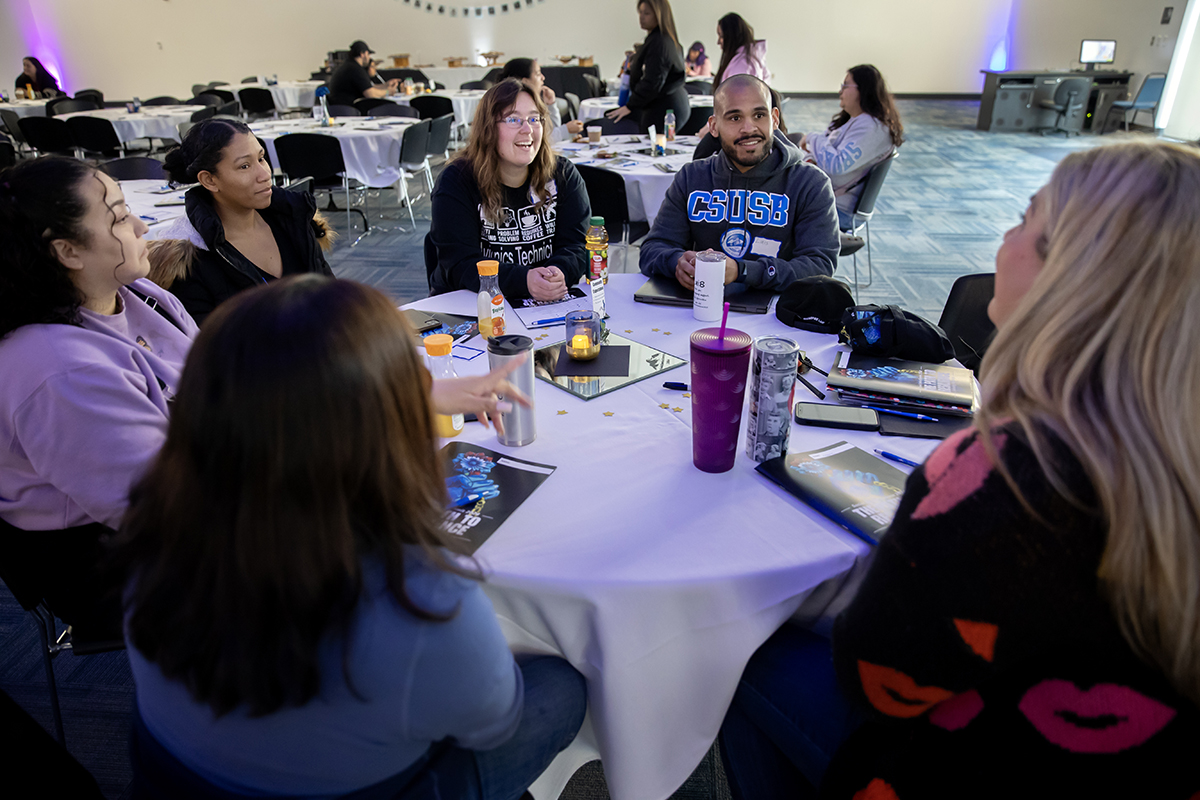 Attendees participated in group activities during the keynote address at the Social Justice Summit, where they reflected on goals and moments of sacrifice. 