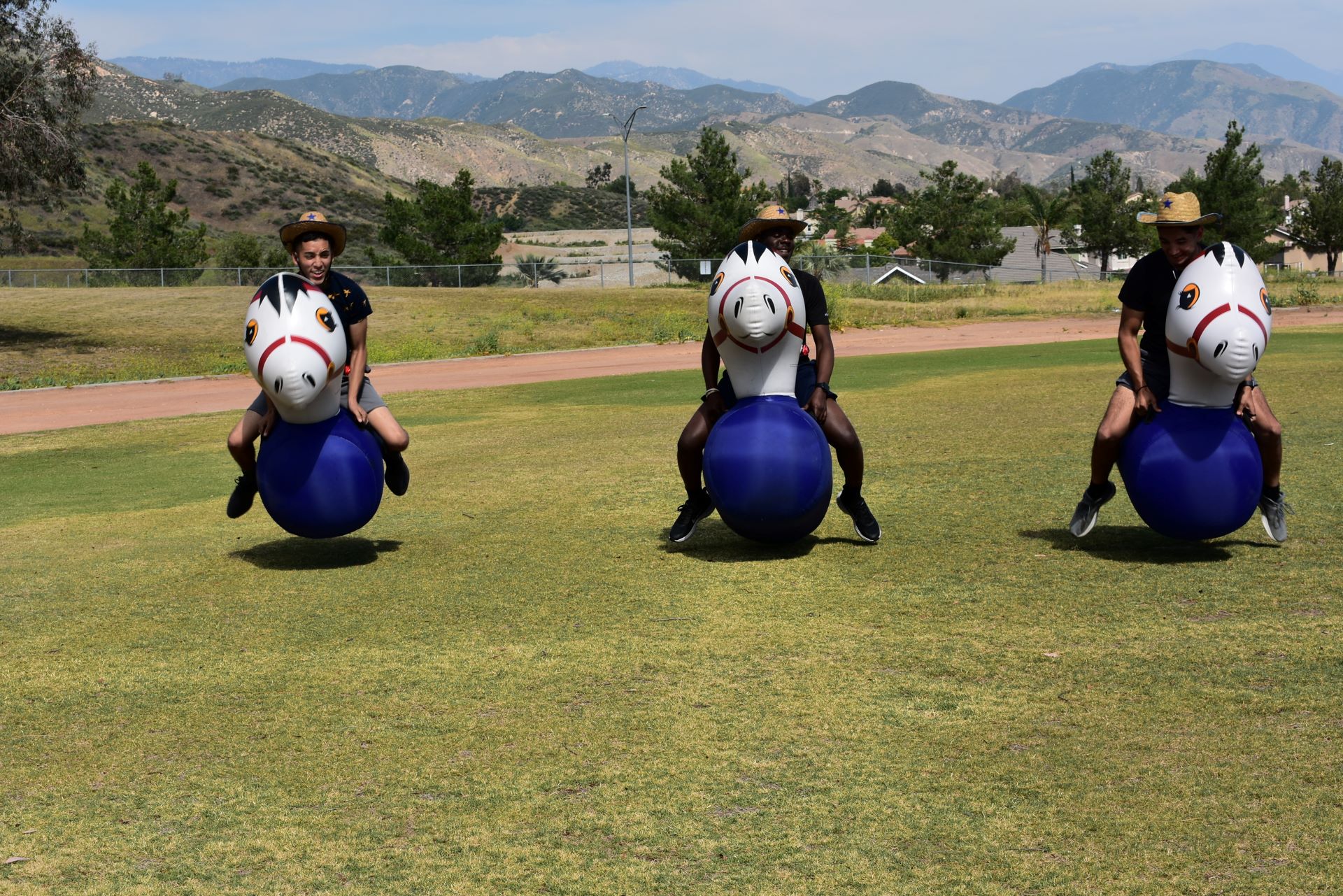 FSL playing on inflatable horses