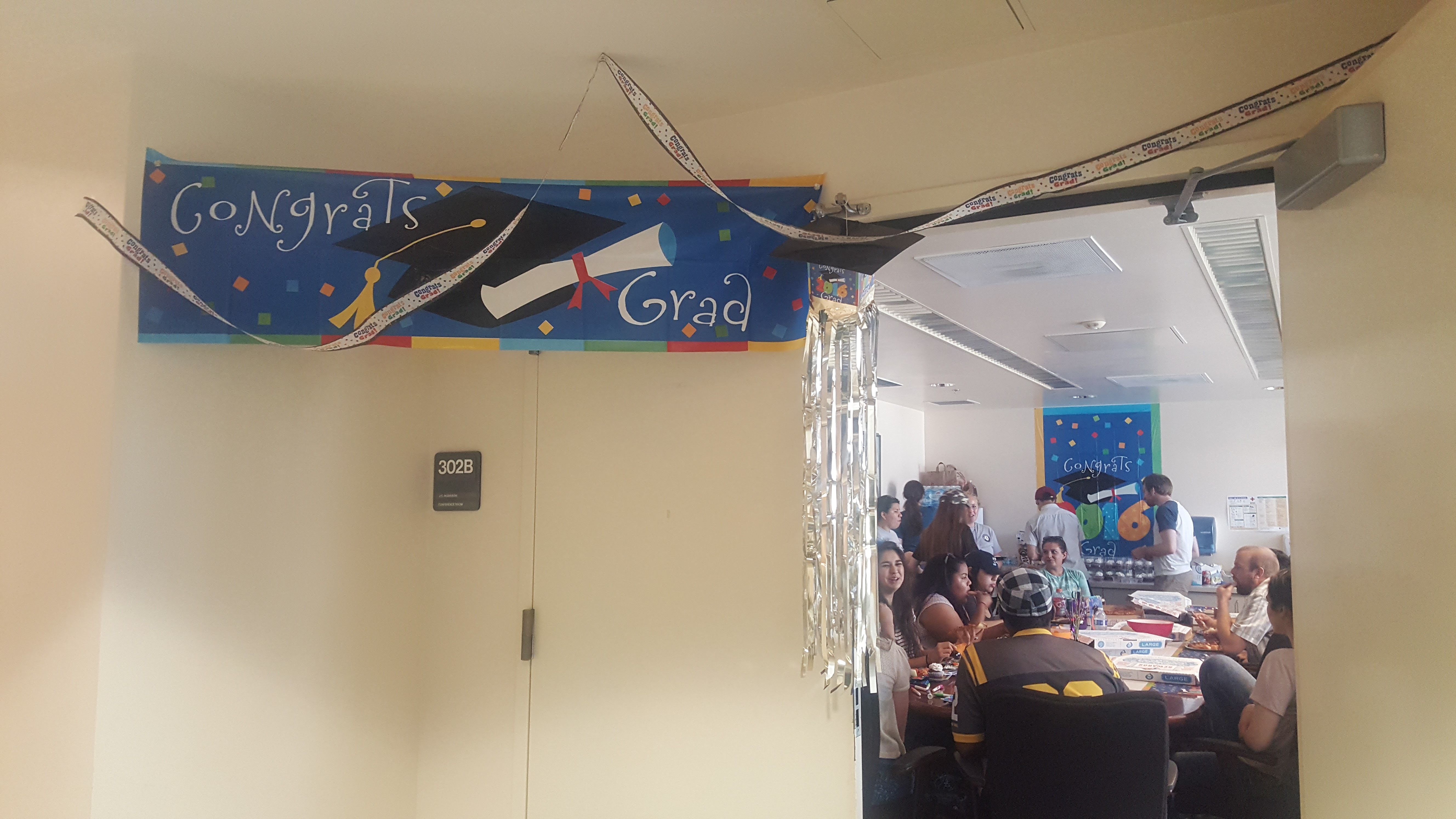 Picture of people and banner