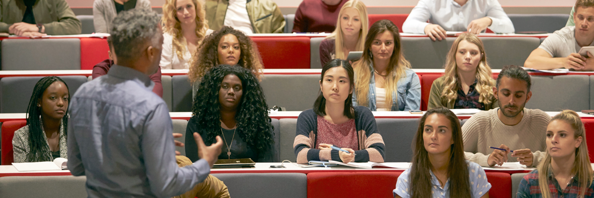 Students in a Customized Program Listening to a Lecture