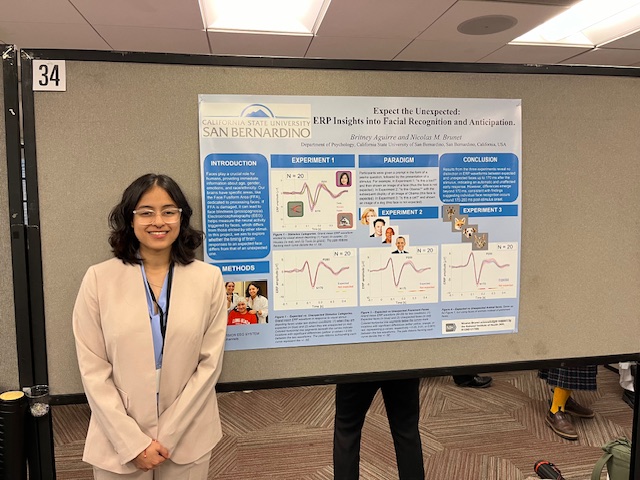Britney Aguire presents the findings of her research on how the brain processes facial information.