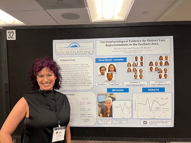 Krisha Orgo presents her work, aimed to shed light on how neurons in face-sensitive areas of the brain are activated.