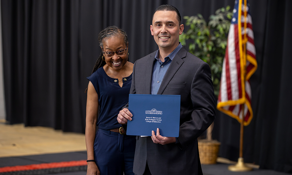 Dr. Stacie Robertson with a Student