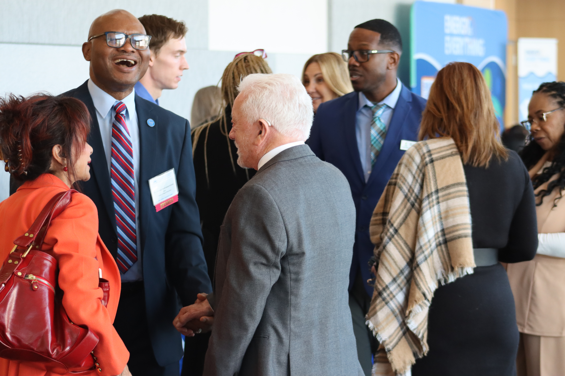 Picture of the Watsons talking with Dean Chinaka DomNwachukwu
