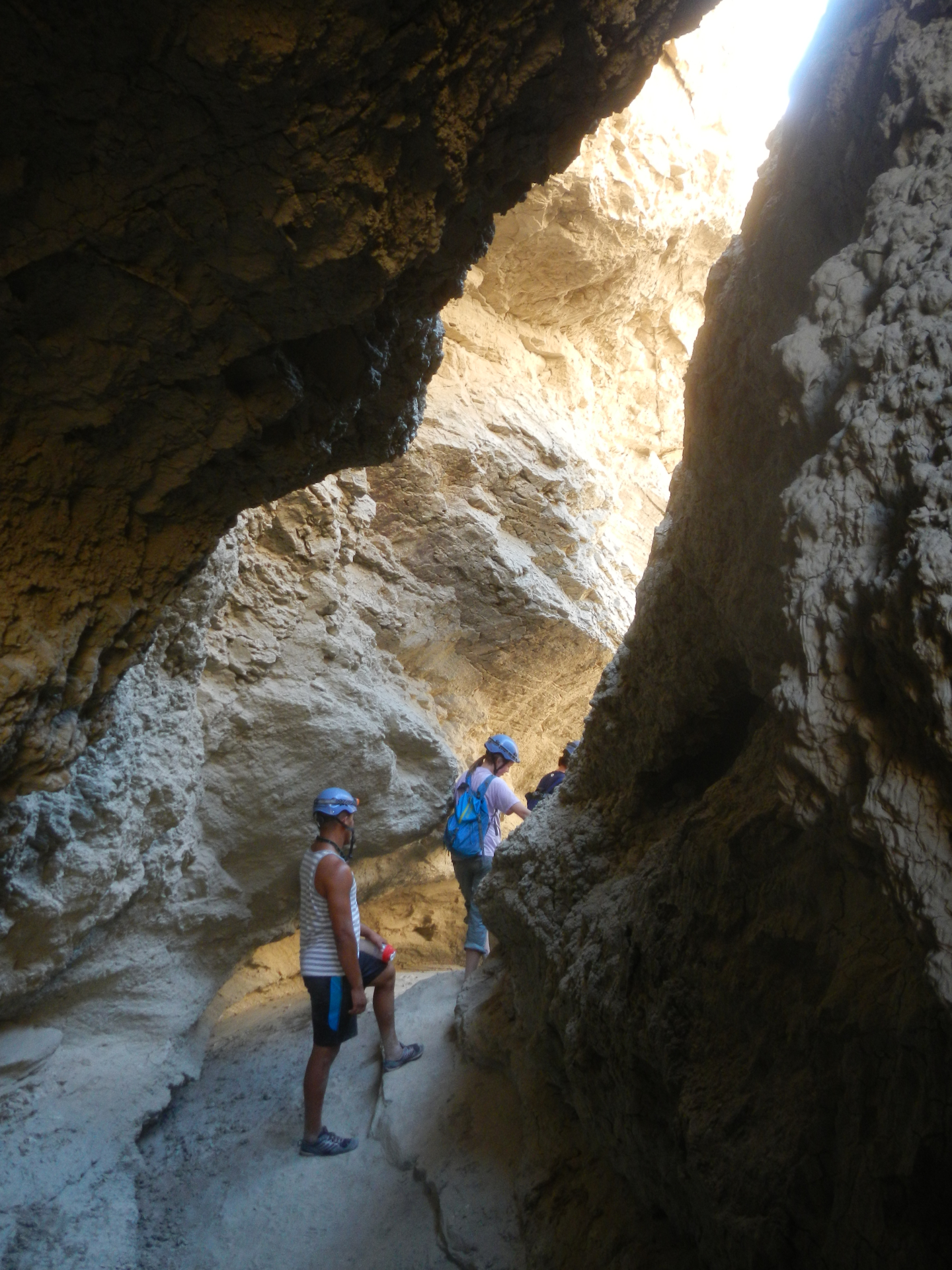 2 people hiking in slot
