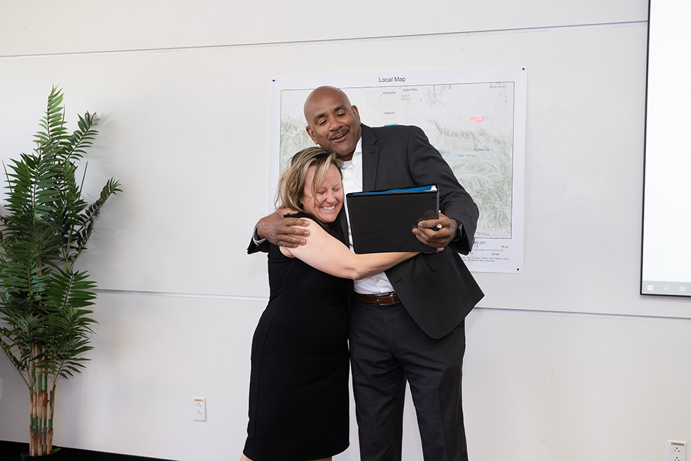 To draw out the surprise, Rafik Mohamed, provost and vice president for Academic Affairs, did not immediately announce the award to Alford. Instead, he showed Alford the cover of his binder, which stated that she was the recipient of the Golden Apple Award, and he eagerly waited for her to realize the significance of the occasion.