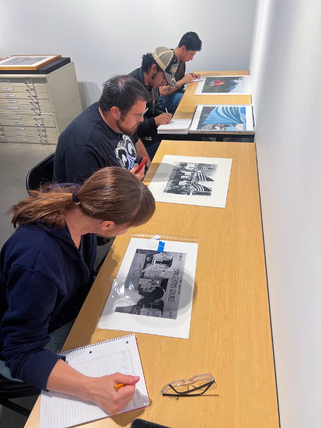 Research, artwork, and curation for “Lens as Witness: Photography and Resistance, 1960–Now” credited to: From Art, Art History and Global Cultures, and Art Education: Alessandro Corsaro, Matthew Dickerson, Molly Fitzgerald, Chrissy Hanula, Joseph Martínez, Jovanna Moya, Jorge Paz Mondragon, Erica Penuela, Nicole F. Scalissi, Meghan Sorenson, Madison Trumpy, Ida Tyus, Alexander Valdez Jr., Ashley J. Vasquez, Sarah Vasquez with Michael Segura, The Garcia Center for the Arts  and Eric Milenkiewicz, Special Collections and University Archives, CSUSB