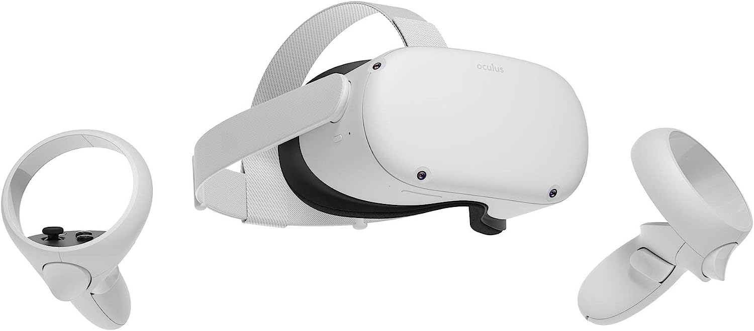 A Meta Quest 2 virtual reality headset with two wireless controllers. The headset is white with a soft fabric strap and built-in tracking cameras on the front. Each controller has a circular ring and buttons for interacting in VR. The setup is designed for untethered, all-in-one virtual reality experiences.